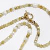 106_collier_ras_de_cou_40_cm_grenat_vert_nacre_grenat_lie_de_vin_fermoir_OT_Gold_filled_journee_singuliere.jpg Collier ras-de-cou en Grenat vert, Nacre et Grenat lie de vin
